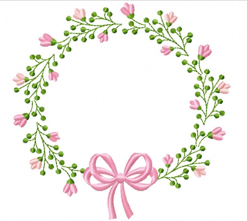 May include: An embroidered floral wreath with pink flowers and green leaves. A pink bow is at the bottom of the wreath. The design is on a white background.