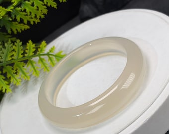 Brazalete de ágata color oro champán claro: 60 mm de alto, transparente, con inserciones de cinta de seda blanca.