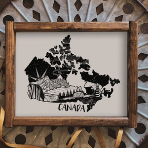 May include: A black and white illustration of Canada with a stylized mountain range, forest, and lighthouse. The text "CANADA" is written below the map.