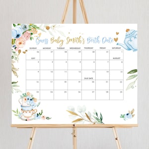 May include: A white calendar with a floral design and a blue teapot. The calendar is for guessing Baby Smith's birth date. The due date is August 20th.