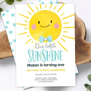May include: A birthday invitation featuring a smiling yellow sun with a blue bow tie and pink cheeks. The text reads "Our little SUNSHINE" and "Mason is turning one." Additional details include the date, time, and RSVP information.