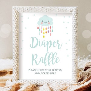 Puede incluir: Un cartel enmarcado en blanco con una nube azul y gotas de lluvia de arcoíris. El cartel dice "Diaper Raffle" y "Please leave your diapers and tickets here."