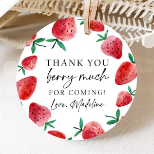 May include: Round white thank you tag with a red watercolor strawberry border. The tag says "Thank you berry much for coming! Love, Madeline".