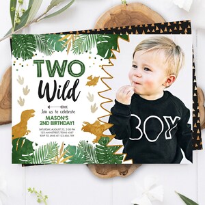 May include: A green and gold dinosaur themed birthday invitation with a photo of a young boy. The invitation says "Two Wild" and includes the text "Join us to celebrate Mason's 2nd Birthday!" with details for the party.