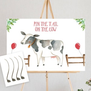 Puede incluir: Un juego imprimible para una fiesta con tem&aacute;tica de granja. El juego se llama "Pin the Tail on the Cow". El juego incluye una vaca blanca y negra con un globo rojo y una cerca. Hay cinco colas grises para poner en la vaca.