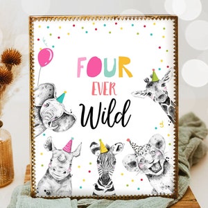 May include: A white sign with a gold frame and colorful confetti dots. The sign says "Four Ever Wild" in black and pink lettering. There are four animals peeking out from behind the sign: an elephant, a giraffe, a rhinoceros, and a zebra. Each animal is wearing a party hat.