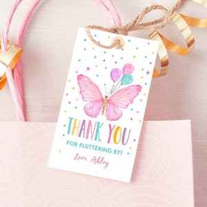 May include: Pink butterfly thank you tag with colorful balloons and confetti. The tag says "Thank You for fluttering by! Love, Ashley."