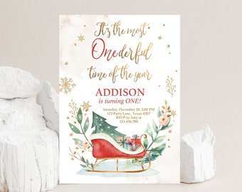 May include: A festive invitation with the text "It's the most Onederful time of the year." The design features a red sleigh with gifts, a Christmas tree, and floral accents. The invitation is for Addison's first birthday.