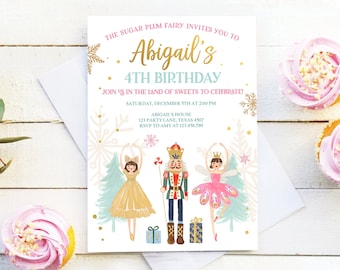 May include: A party invitation with the text "Abigail's 4th Birthday" and illustrations of ballerinas and a nutcracker. The invitation is decorated with gold accents and snowflakes. Two cupcakes with pink frosting are on the right.