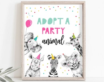 May include: A white sign with the text "Adopt a Party Animal" in pink and teal lettering. The sign is decorated with colorful confetti and features five animal illustrations: an elephant, a giraffe, a rhinoceros, a zebra, and a lion. Each animal is wearing a party hat.