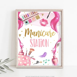 May include: A pink and gold sign with the text "Manicure Station" in gold lettering. The sign is decorated with images of makeup, nail polish, and lipstick.