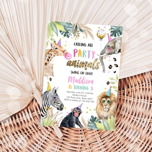 May include: A colorful party invitation with a jungle theme. The invitation features a giraffe, zebra, lion, and monkey wearing party hats. The text on the invitation reads "Calling all party animals! Swing on over! Maddison is turning 3. Saturday, June 22, 2:00 PM. Ashley's House. 123 Party Lane, Texas 4567. RSVP to Ashley at 123.456.789"