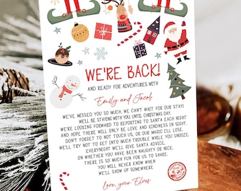 May include: A white rectangular Christmas card featuring colorful illustrations of Santa, a reindeer, a snowman, gifts, and elf legs. The text reads: WE'RE BACK! AND READY FOR ADVENTURES WITH Emily and Jacob, followed by a poem from the elves.