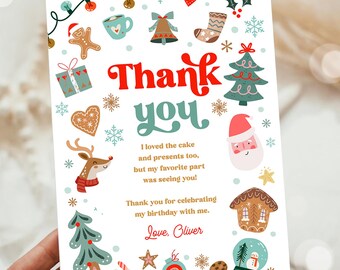 May include: A Christmas-themed thank you card with the words "Thank you" in red and teal. The card features festive illustrations of a gingerbread man, Christmas tree, Santa, and snowflakes. The message reads, "I loved the cake and presents too, but my favorite part was seeing you!"