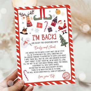 May include: A rectangular Christmas card with a red and white striped border. The card features illustrations of a reindeer, elf legs, a snowman, a Christmas tree, and gifts. It includes the text I'M BACK! AND READY FOR ADVENTURES WITH Emily and Jacob, followed by a message from an elf and a North Pole stamp.