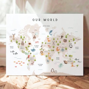 May include: A white canvas print featuring a world map with continents in beige and oceans in blue. The map is decorated with animal illustrations and the text "OUR WORLD". Includes the text "DESIGN MY PARTY STUDIO".