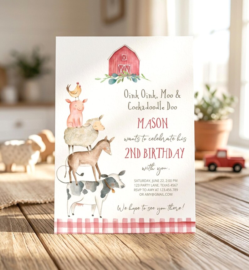 May include: A birthday invitation card featuring a watercolor illustration of a red barn and a stack of farm animals including a cow, donkey, sheep, pig, and chicken. The text reads Oink Oink, Moo & Cockadoodle Doo, MASON wants to celebrate his 2ND BIRTHDAY with you, and includes event details and a red gingham border.