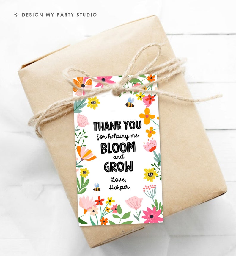 May include: A white thank you tag with a floral border. The text reads "Thank you for helping me bloom and grow. Love, Harper".