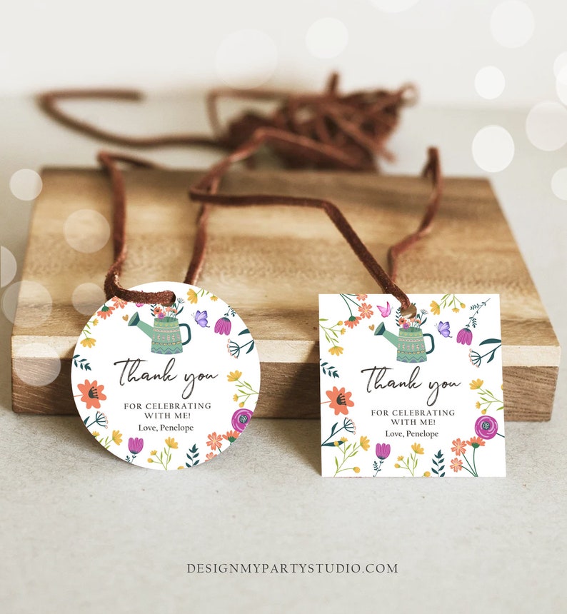 May include: Round and square thank you tags with a floral design and a watering can illustration. The text on the tags reads "Thank you for celebrating with me! Love, Penelope".