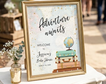May include: A framed sign with a world map background featuring the text Adventure awaits, Welcome to Jessica's Baby Shower, and March 18, 20XX. The design includes a stack of four colorful vintage-style suitcases topped with a small globe.