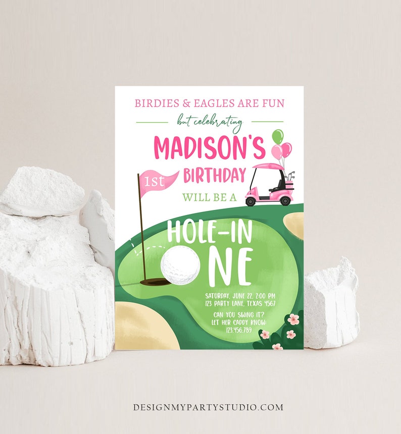 May include: A birthday invitation with a golf theme, featuring a green golf course design. The invitation includes the text "Madison's 1st Birthday" and "Hole-in-One". A pink golf cart and golf ball are also shown. The invitation is set against a white background.
