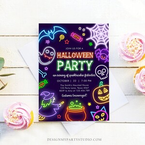 May include: A Halloween party invitation with neon-style illustrations of a bat, ghost, spider, skull, pumpkin, and witch. The invitation text reads "Join us for a Halloween Party" with the date, time, and RSVP information. Costumes are encouraged.