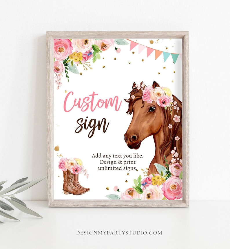 May include: A printable sign with a watercolor illustration of a brown horse wearing a pink floral crown. The sign says "Custom sign" and "Add any text you like. Design & print unlimited signs." The sign is framed in a brown frame.