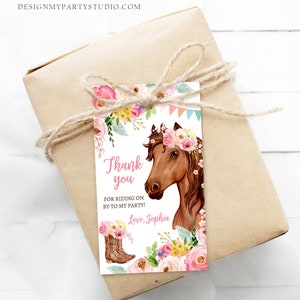 May include: Thank you for riding on by to my party!  Love, Sophia.  A brown horse with a pink flower crown and a floral border.  The tag is perfect for a horse-themed party favor.