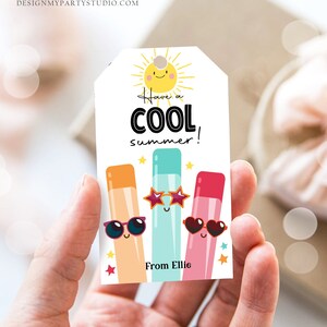 May include: A colorful tag with a sun and three popsicle characters wearing sunglasses. The tag says "Have a COOL summer!" and "From Ellie".