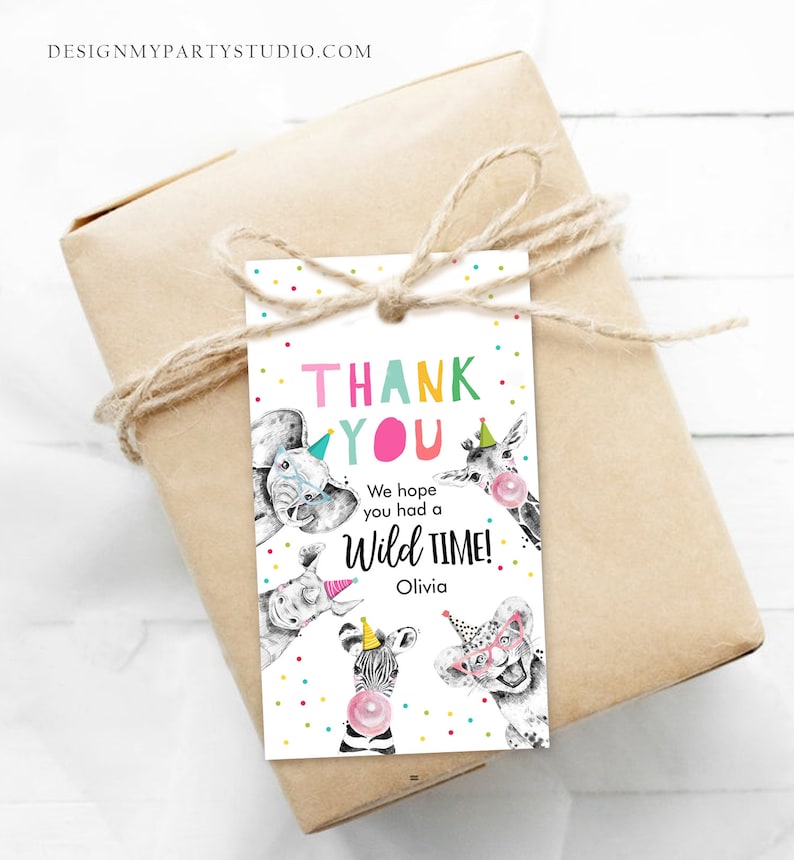 May include: Thank you card with a white background and colourful confetti. The card features a cartoon elephant, giraffe, rhino, zebra, and lion wearing party hats. The text reads "Thank You" in colourful letters and "We hope you had a Wild Time! Olivia".