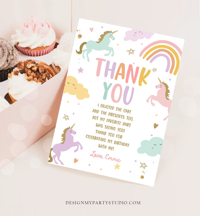 May include: A thank you card with a rainbow, unicorns, and stars. The text reads "Thank You. I enjoyed the cake and the presents too. But my favorite part was seeing you! Thank you for celebrating my birthday with me! Love, Emma."