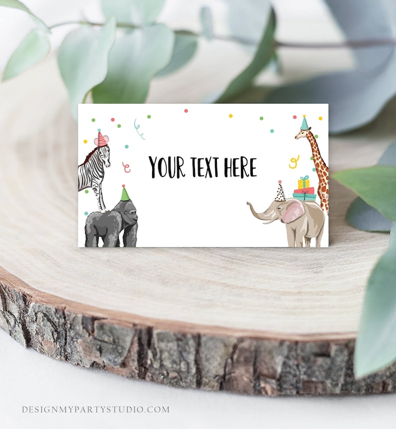 May include: White place card with a zebra, gorilla, elephant, and giraffe wearing party hats. The card has confetti and the text "YOUR TEXT HERE".