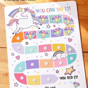 Könnte beinhalten: Eine farbenfrohe Belohnungstafel mit einem Einhorn, Diamanten, Sternen und einem Regenbogen. Der Text "YOU CAN DO IT!" und "YOU DID IT!" sind zu sehen. Die Tafel hat Felder für einen Namen und eine Belohnung.