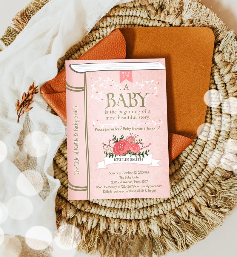 May include: Pink and gold baby shower invitation with a book design. The text reads "A Baby is the beginning of a most beautiful story." The invitation includes the date, time, location, and RSVP information.