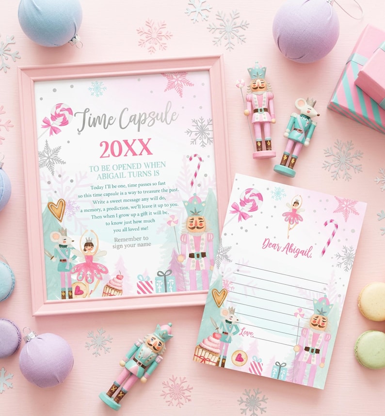 May include: A pink framed time capsule sign and a matching letterhead featuring nutcracker, mouse, and ballerina illustrations with candy and snowflake motifs. The text reads Time Capsule 20XX, To be opened when Abigail turns is, and Dear Abigail.