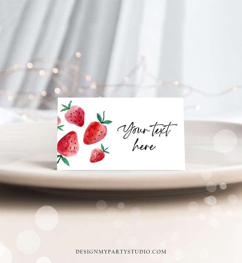 May include: White card with a watercolor illustration of red strawberries and green leaves. The text "Your text here" is written in black cursive.