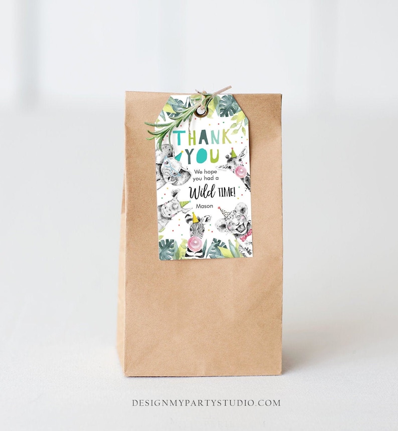 May include: A brown paper gift bag with a decorative tag. The tag features a watercolor illustration of various safari animals, including a zebra, lion, and giraffe, with the words "THANK YOU" and "We hope you had a Wild Time!"