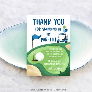 May include: A golf-themed thank you card with the text "THANK YOU FOR SWINGING BY MY PAR-TEE!". The card features a golf course illustration with a golf ball, flag, and golf cart. The text "I enjoyed the cake and the presents too, but my favorite part was seeing you! It was a ball celebrating with you! Love, Jackson."