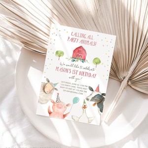 May include: A colorful invitation for a first birthday party with a farm theme. The invitation features a red barn, a pig, a sheep, a cow, and a goose. The text on the invitation reads "Calling all party animals! We would like to celebrate Mason's 1st Birthday with you!"