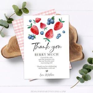 May include: A white thank you card with a watercolour illustration of strawberries and blueberries. The text reads "Thank you Berry Much. I loved the cake and the presents too, but my favourite part was seeing you! Thank you for celebrating my birthday with me! Love, Madeline."