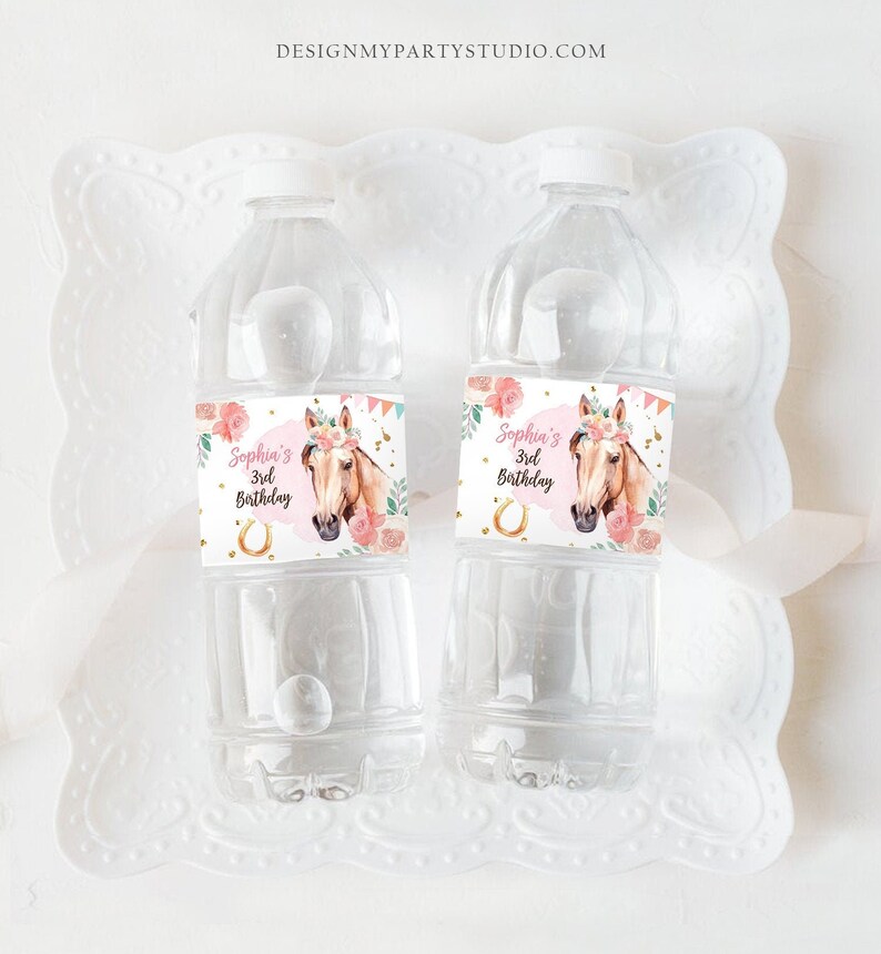 May include: Two clear plastic water bottles with pink and gold labels. The labels feature a watercolor illustration of a horse with a floral crown and the text "Sophia's 3rd Birthday".