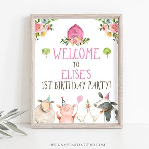 Peut inclure: Une pancarte d'accueil imprimable pour une f&ecirc;te d'anniversaire sur le th&egrave;me de la ferme. La pancarte repr&eacute;sente une grange rose, des fleurs et des animaux de la ferme portant des chapeaux de f&ecirc;te. Le texte indique "Bienvenue &agrave; la f&ecirc;te du 1er anniversaire d'Elise !"