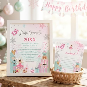 May include: A white framed sign titled Time Capsule 20XX with text instructions for Abigail's 18th birthday, featuring illustrations of a nutcracker, ballerina, mouse, and candy. Beside it, a wicker basket holds matching stationery cards.