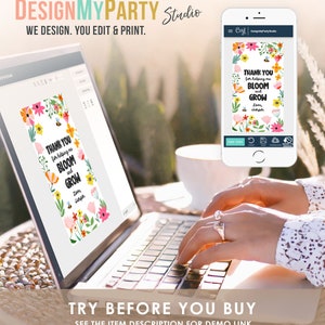 May include: A laptop screen displaying a digital design of a thank you card with a floral pattern and the text "Thank you for helping me bloom and grow". The card is surrounded by a white border. The laptop is on a table with a cup of coffee.