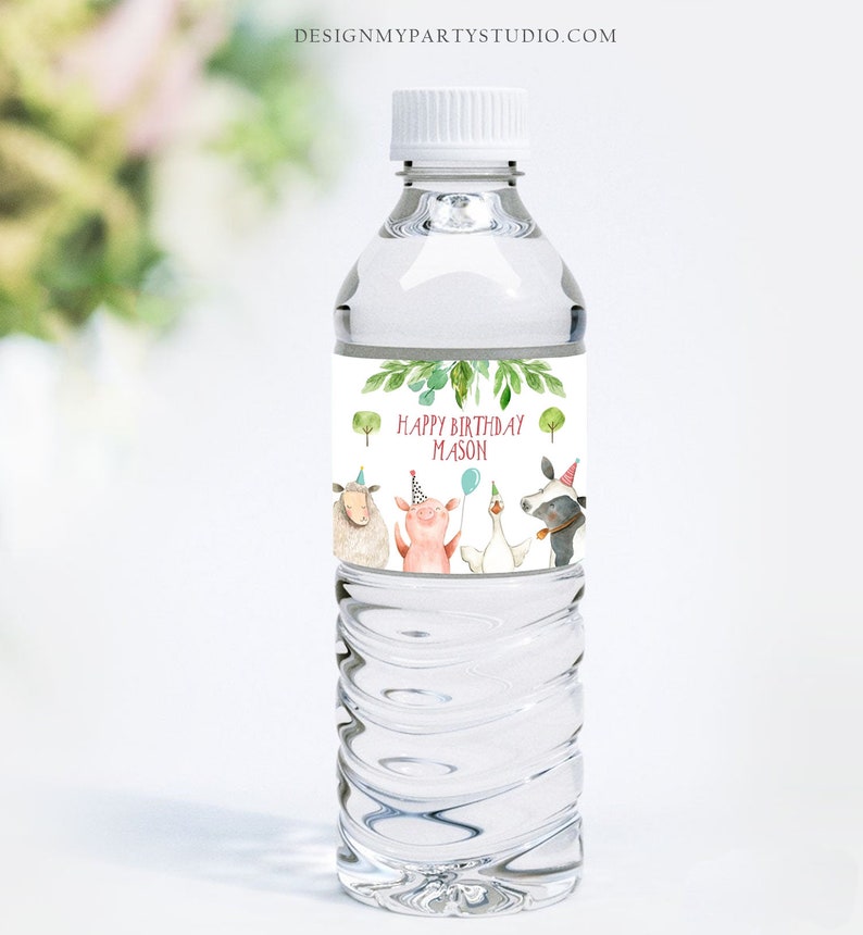 May include: Water bottle label with a farm animal theme. The label features a pig, sheep, goose, and cow wearing party hats. The text on the label reads "Happy Birthday Mason".