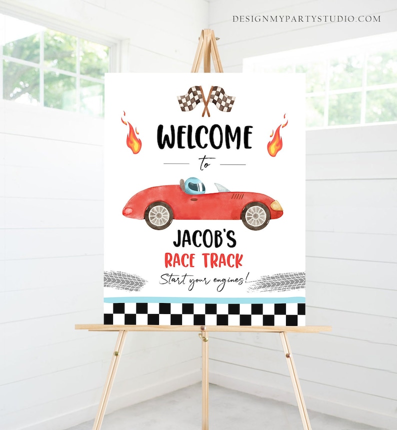 May include: Welcome to Jacob's Race Track sign with a red race car, checkered flag, and tire tracks. Start your engines!