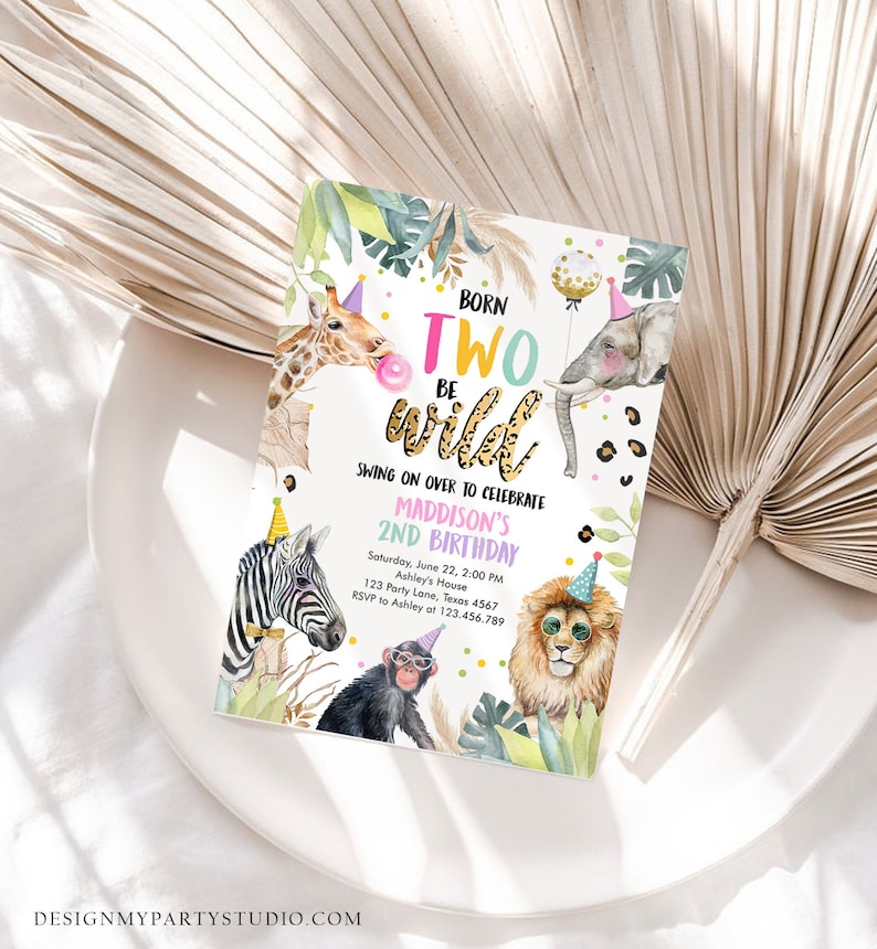 May include: A colorful invitation for a 2nd birthday party with a jungle theme. The invitation features a giraffe, zebra, lion, monkey, and elephant with party hats. The text reads "Born Two Be Wild" and includes the party details.