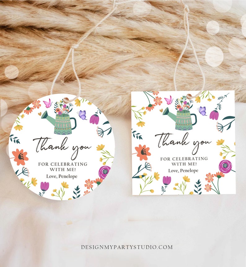 May include: Two thank you tags with a floral design and a watering can with flowers. The text on the tags reads "Thank you for celebrating with me! Love, Penelope".