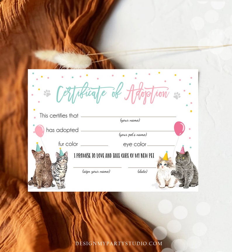 May include: A printable certificate of adoption for a pet. The certificate has a pink and blue color scheme with confetti and paw prints. It includes spaces to fill in the adopter's name, the pet's name, fur color, eye color, and a signature line.
