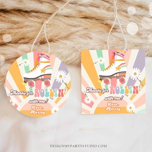 May include: Two round and rectangular thank you tags with a retro 70s design. The tags feature a white roller skate with rainbow accents and a daisy design. The text on the tags reads "Thanks for rollin' with me! Love, Marley".